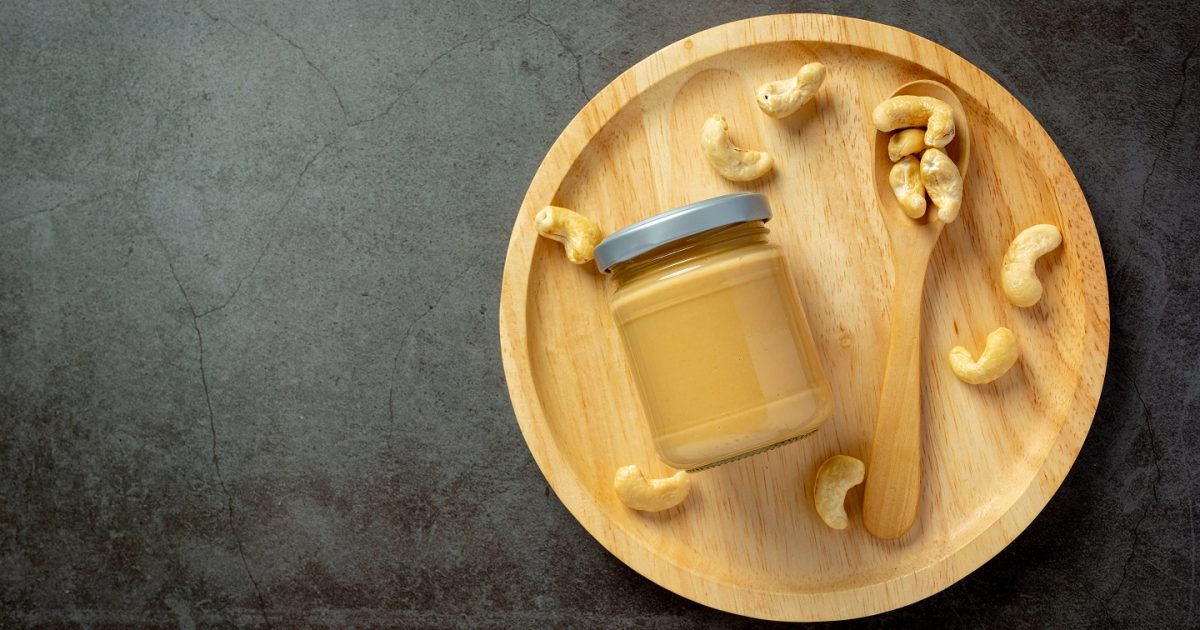 cashew butter on dark background